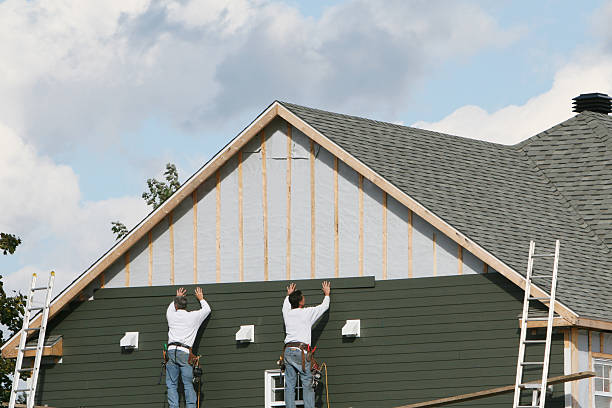 Professional Siding Contractor technician working in Highland Park, PA